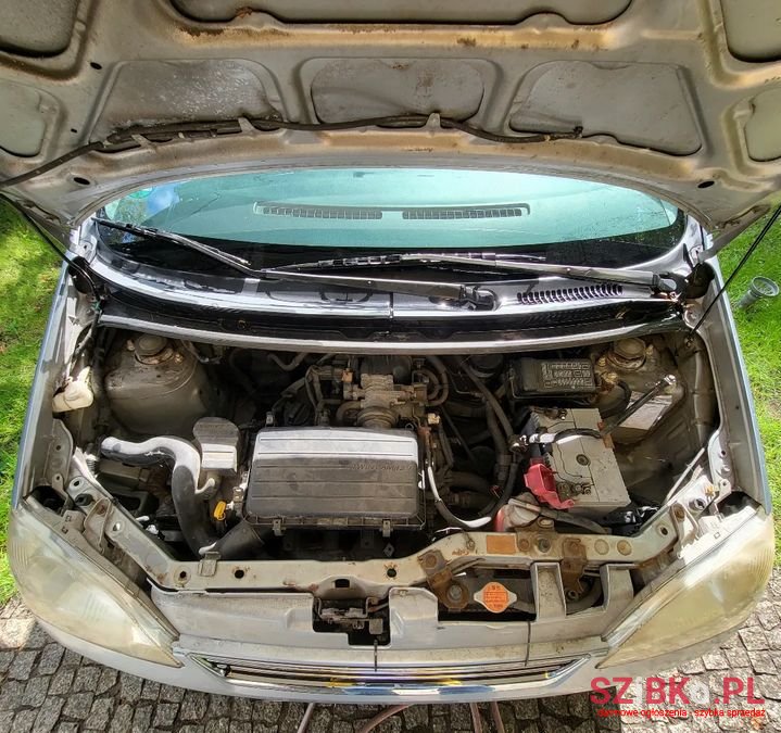 2003' Daihatsu Cuore photo #5