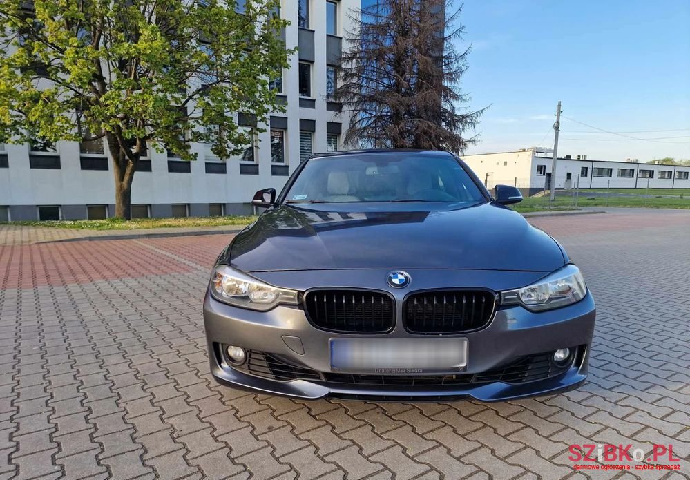 2012' BMW 3 Series 328I Touring photo #5