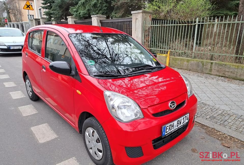 2009' Daihatsu Cuore photo #2