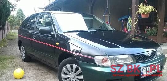 2007' Nissan Almera photo #1