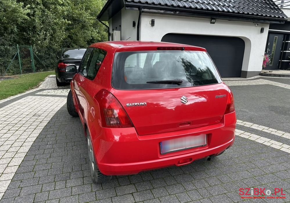 2007' Suzuki Swift 1.3 Sakura photo #4