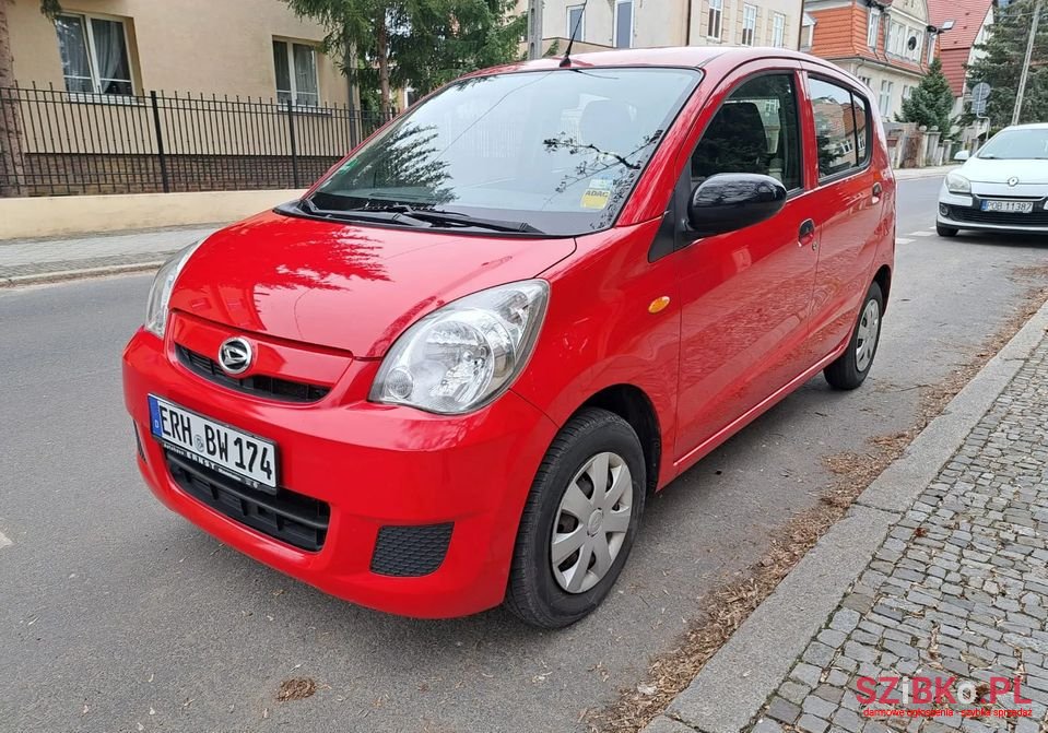 2009' Daihatsu Cuore photo #1