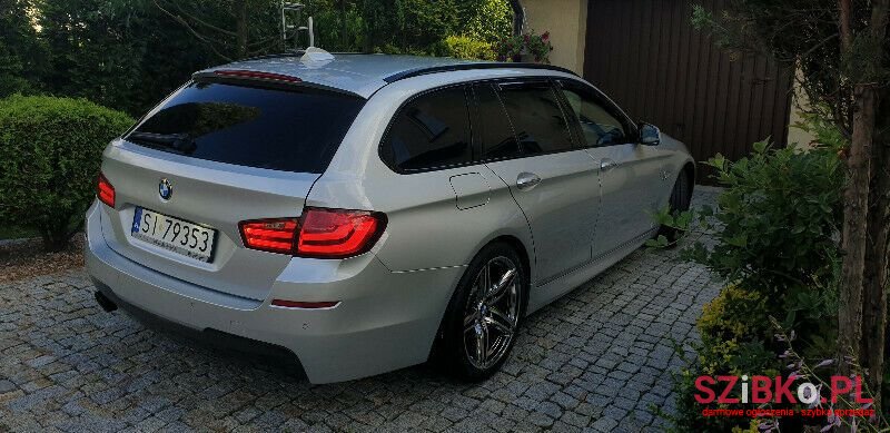 2011' BMW 520 photo #3