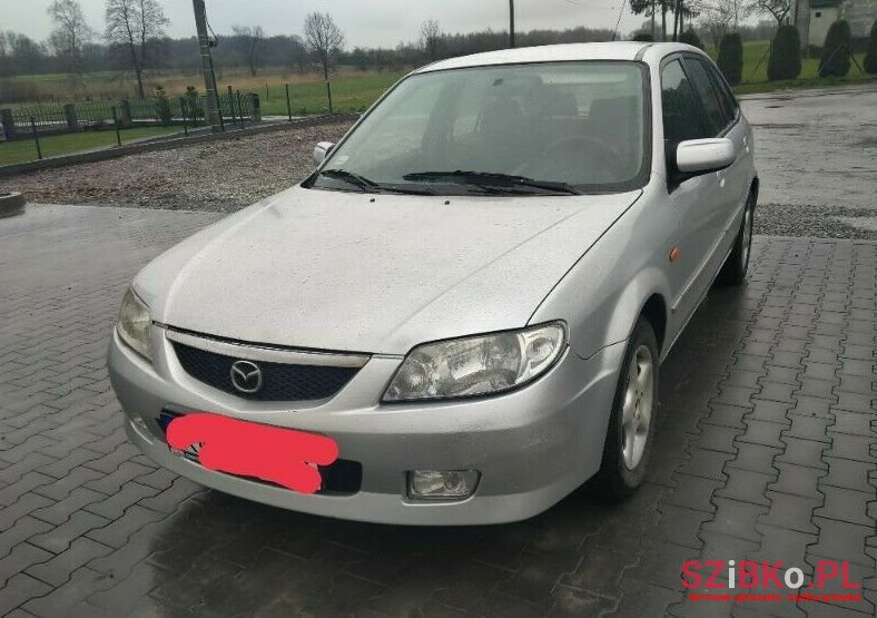 2001' Mazda 323 photo #1