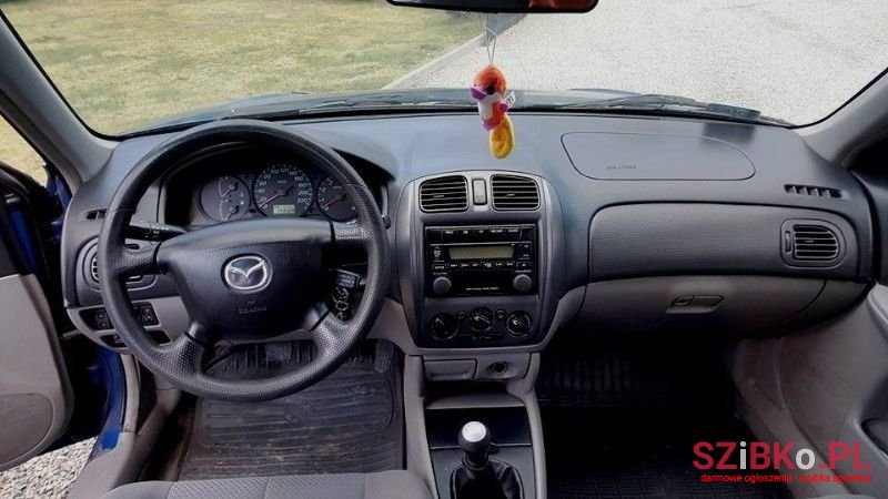 2002' Mazda 323 photo #2
