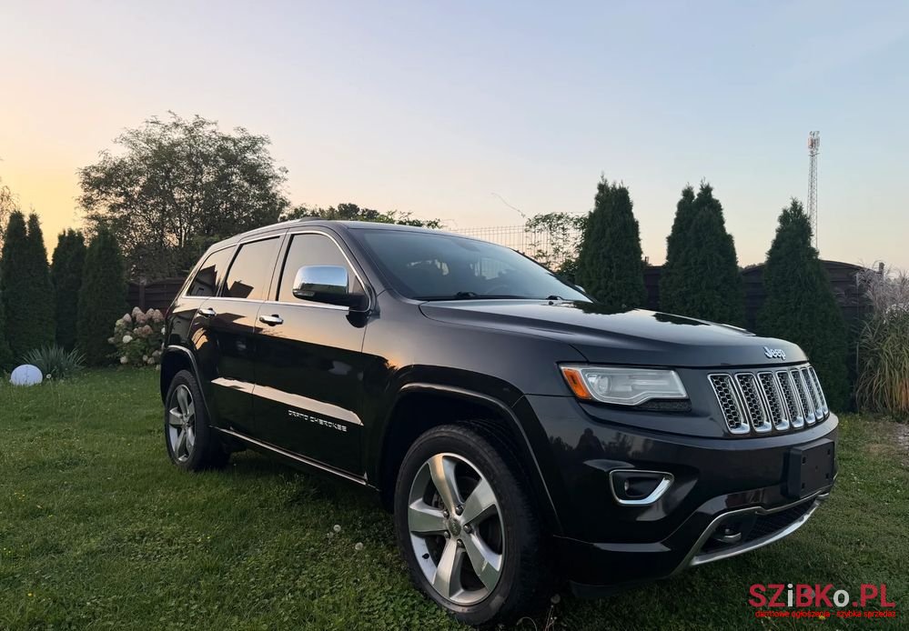 2014' Jeep Grand Cherokee photo #3
