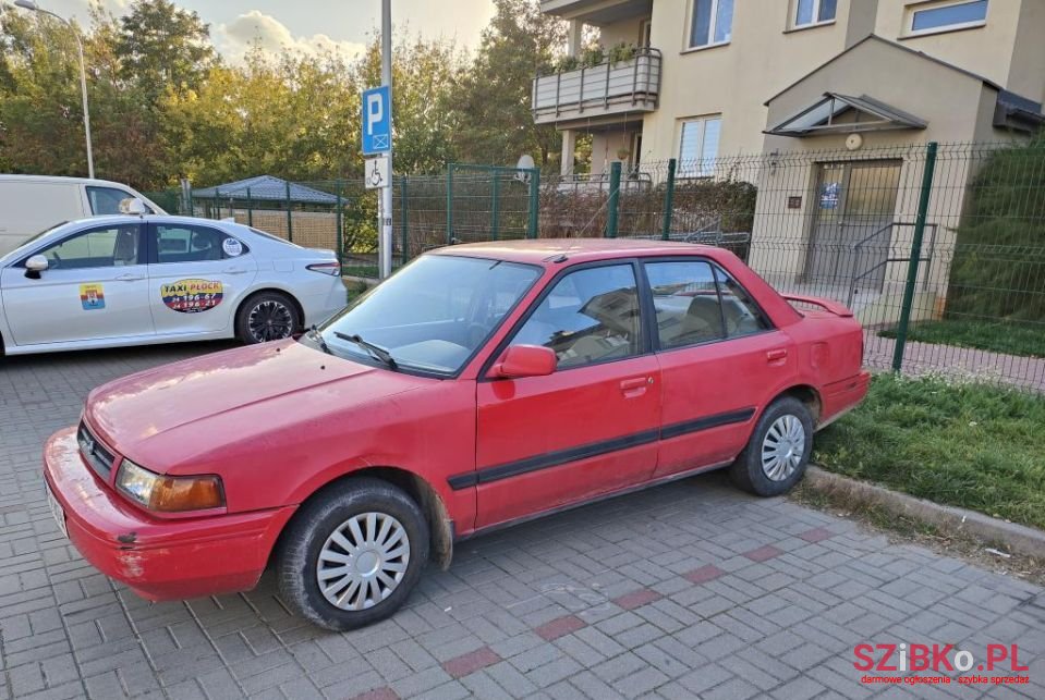1995' Mazda 323 photo #1