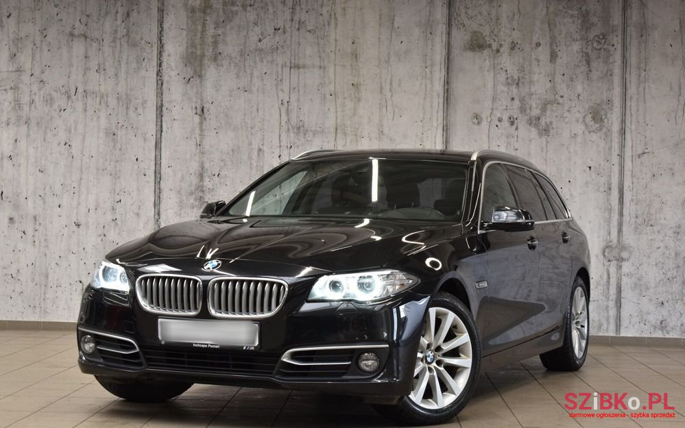 2013' BMW 5 Series photo #1