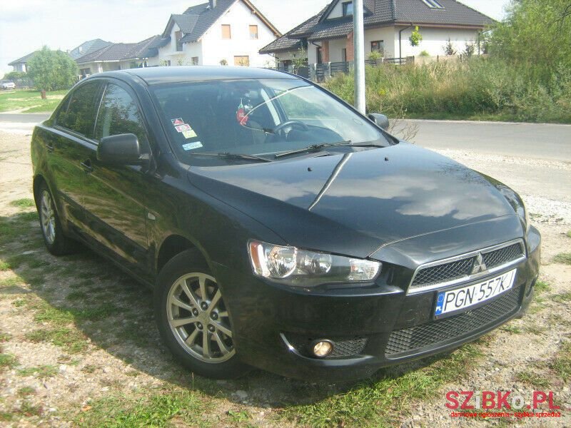 2013' Mitsubishi Lancer photo #2