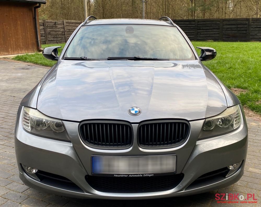 2009' BMW 3 Series 320I Touring photo #1