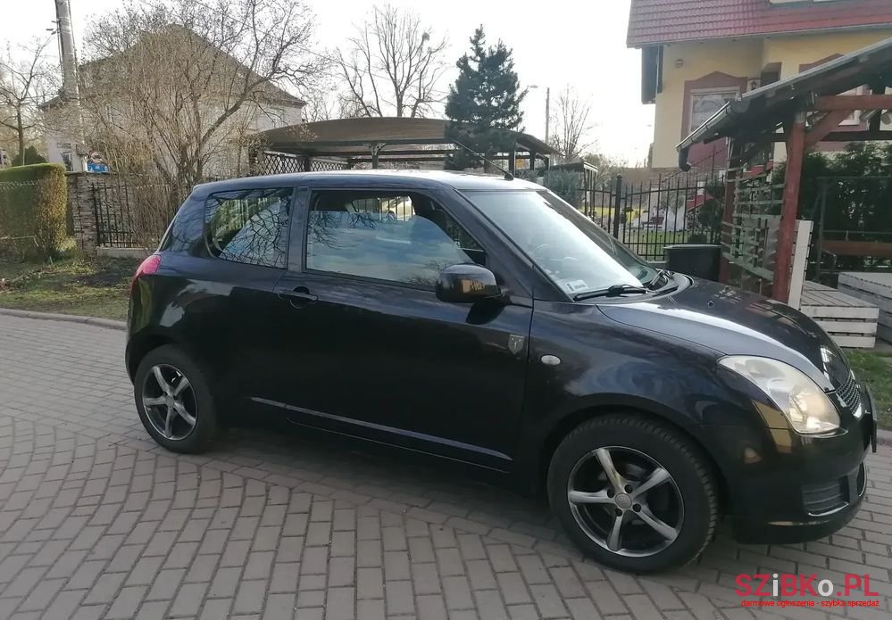 2009' Suzuki Swift photo #1