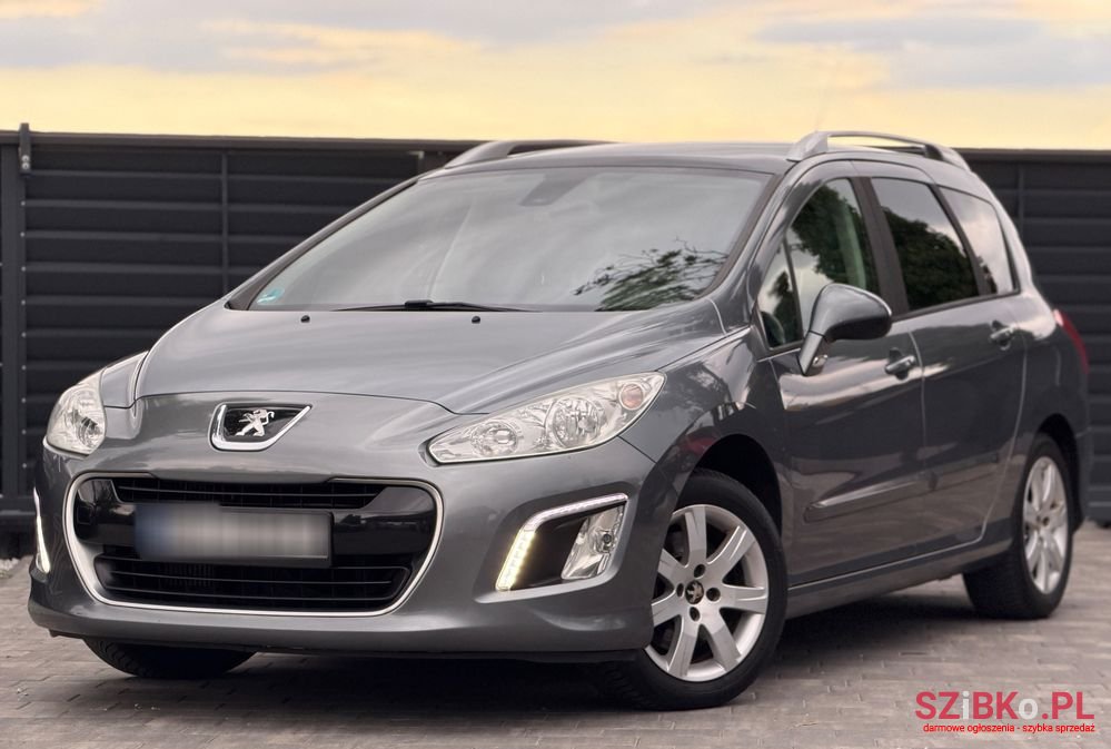 2011' Peugeot 308 photo #1