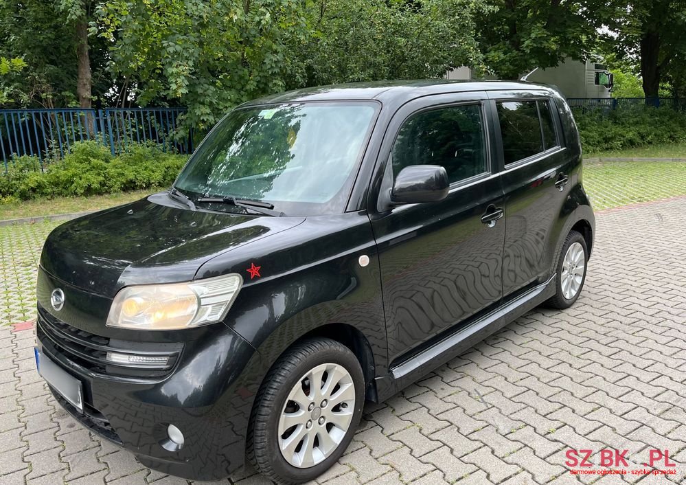 2009' Daihatsu Materia 1.3 photo #1