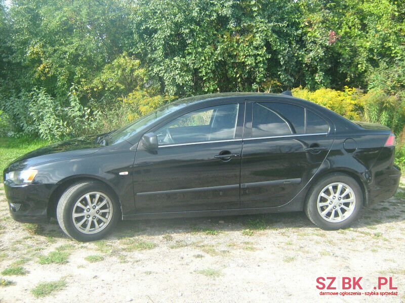 2013' Mitsubishi Lancer photo #3