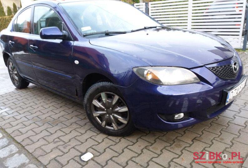 2004' Mazda 3 photo #1