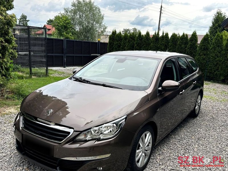 2014' Peugeot 308 Sw photo #1