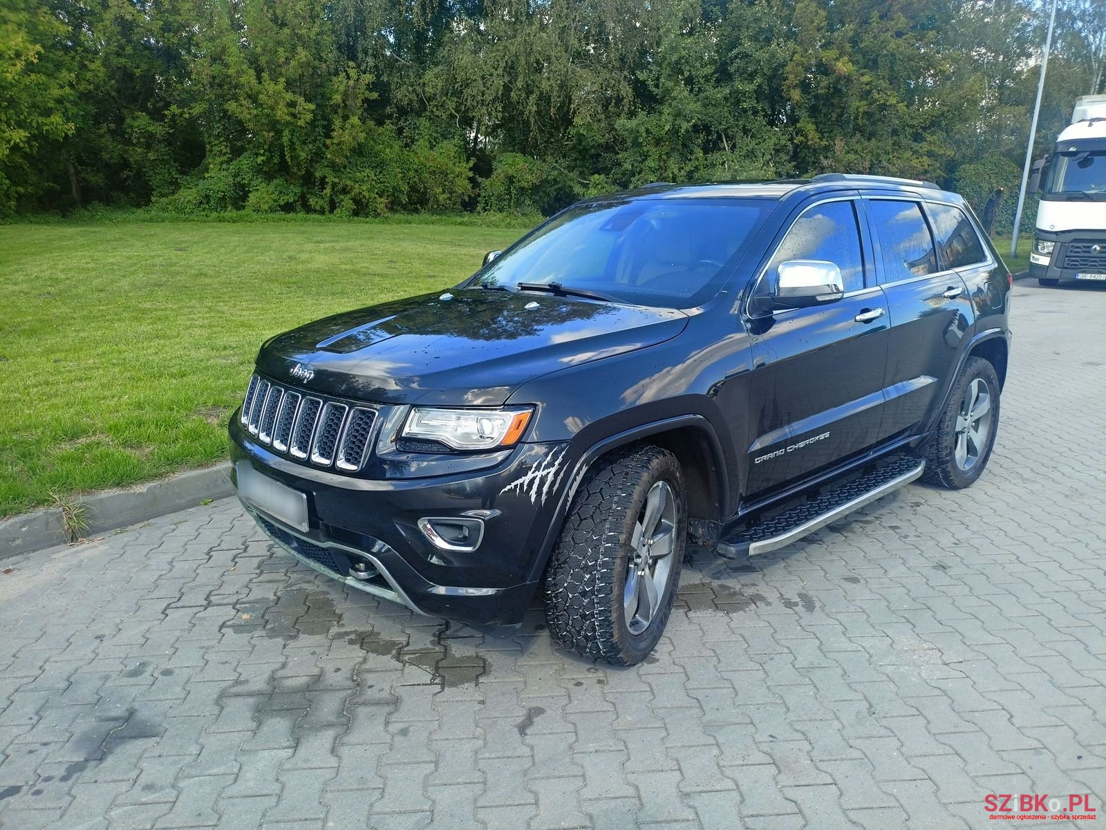 2014' Jeep Grand Cherokee photo #2