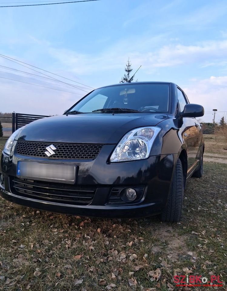 2009' Suzuki Swift photo #4
