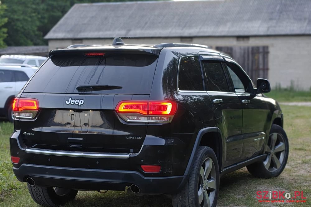 2014' Jeep Grand Cherokee photo #3