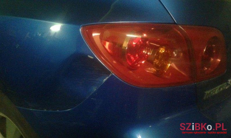 2004' Mazda 3 photo #1