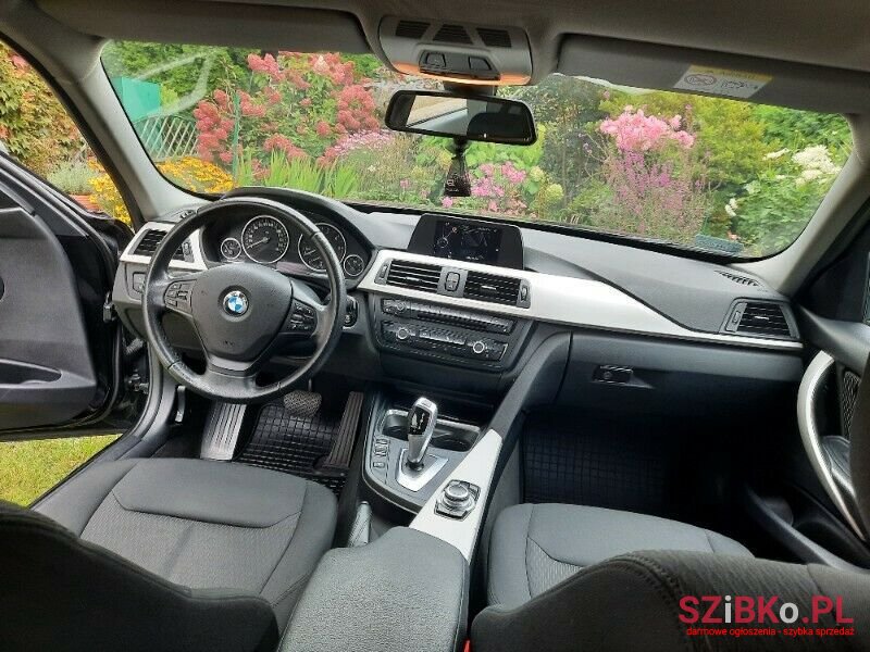 2014' BMW 318 photo #3