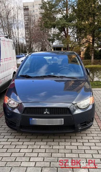 2009' Mitsubishi Colt photo #1