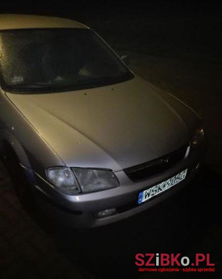 2000' Mazda 323 photo #1