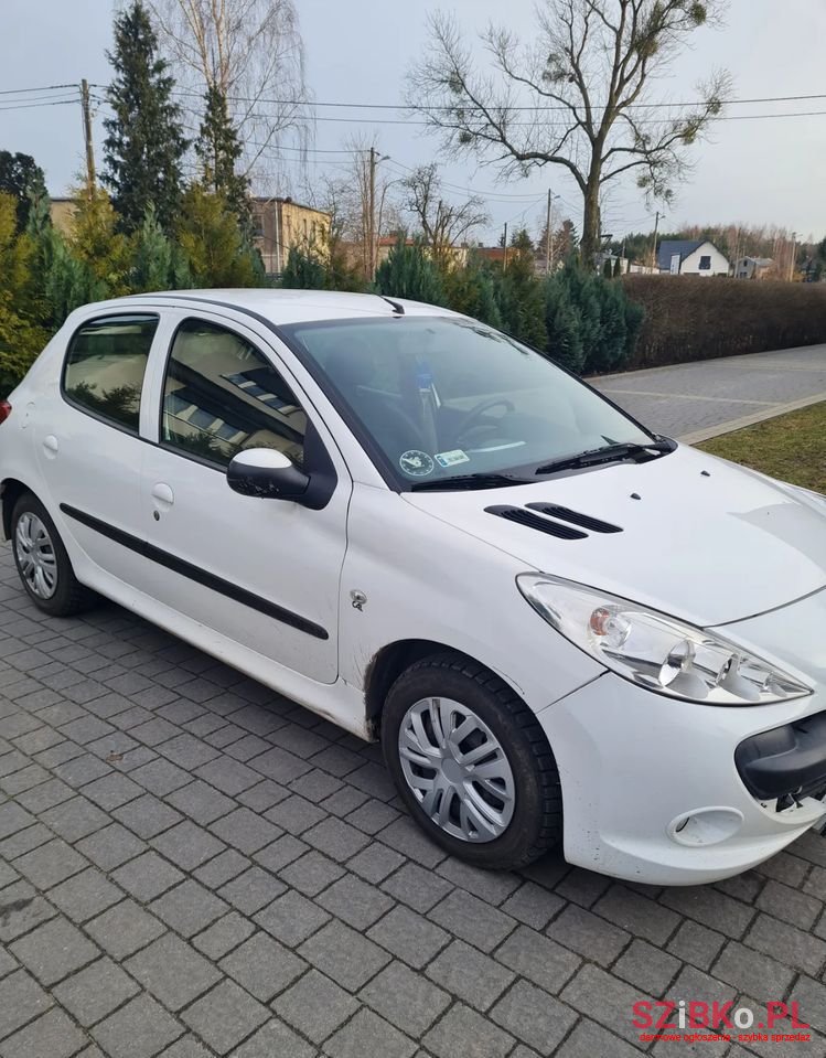 2011' Peugeot 206 Plus photo #1