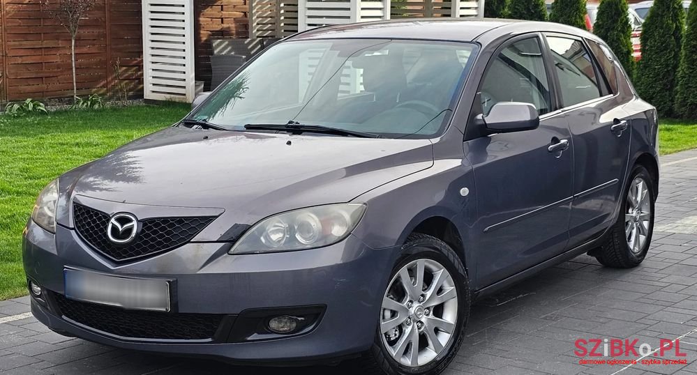 2006' Mazda 3 photo #1