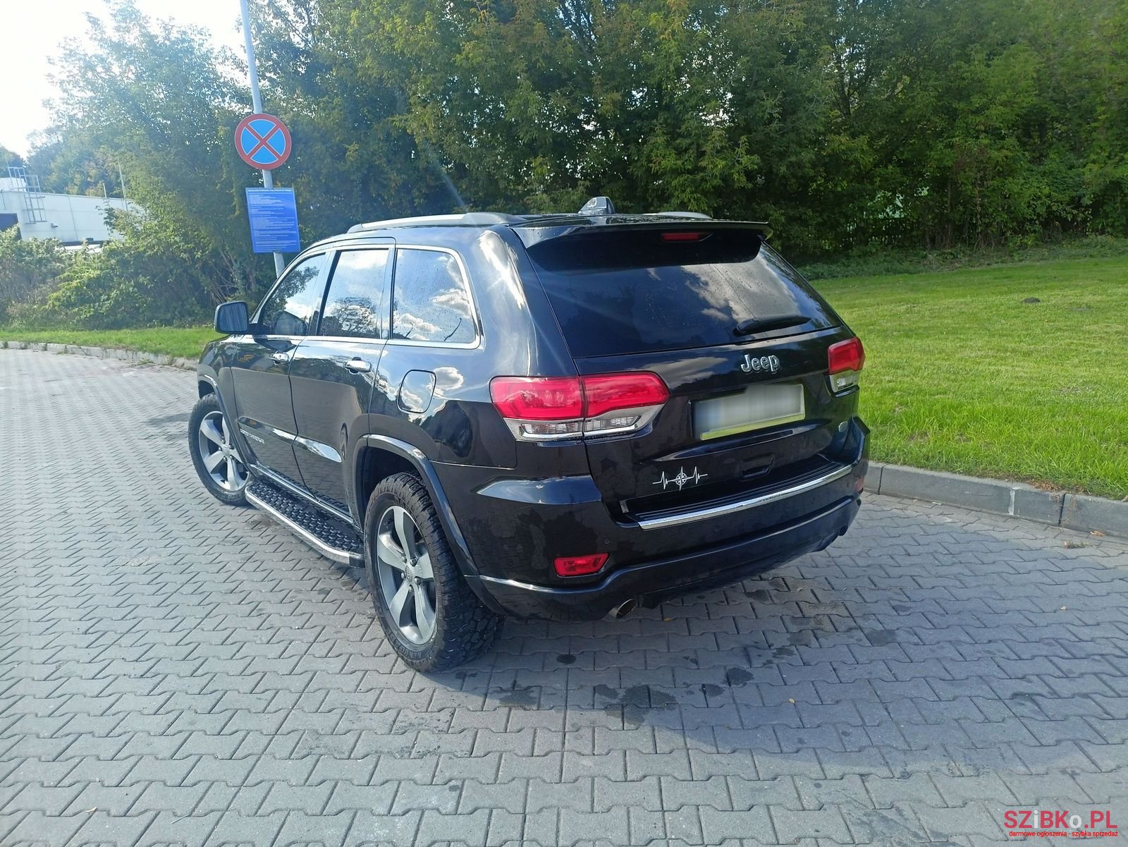 2014' Jeep Grand Cherokee photo #3