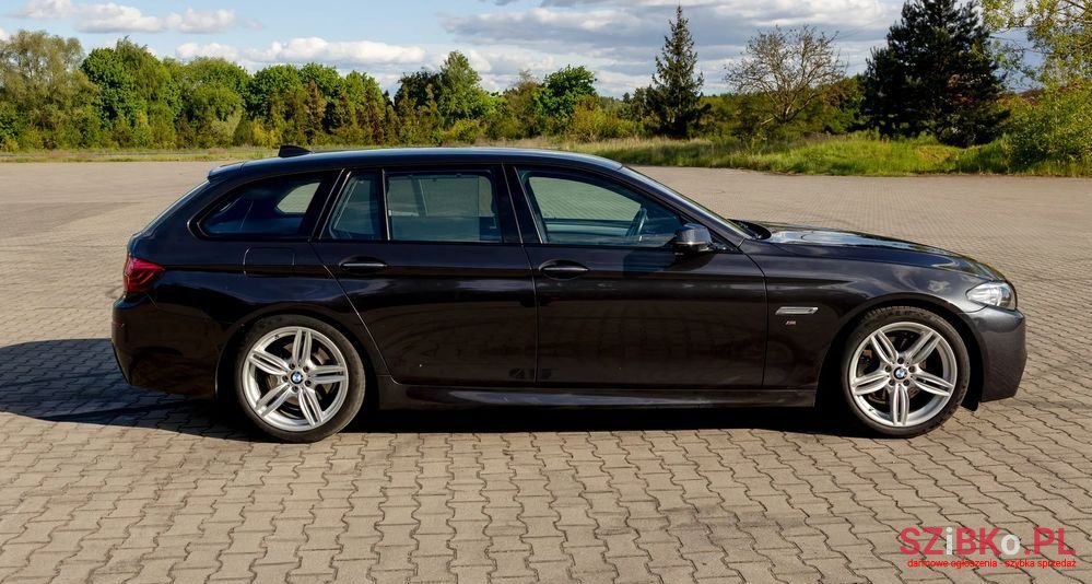 2014' BMW 5 Series 520D Touring Sport-Aut photo #5