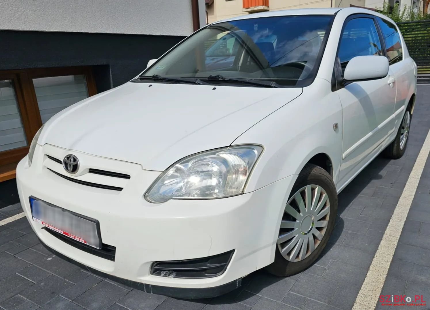 2004' Toyota Corolla photo #1