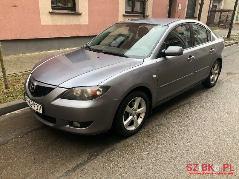 2004' Mazda 3 photo #1