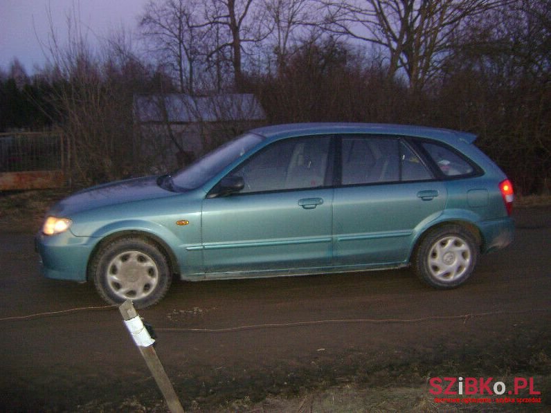 2002' Mazda 323 photo #1