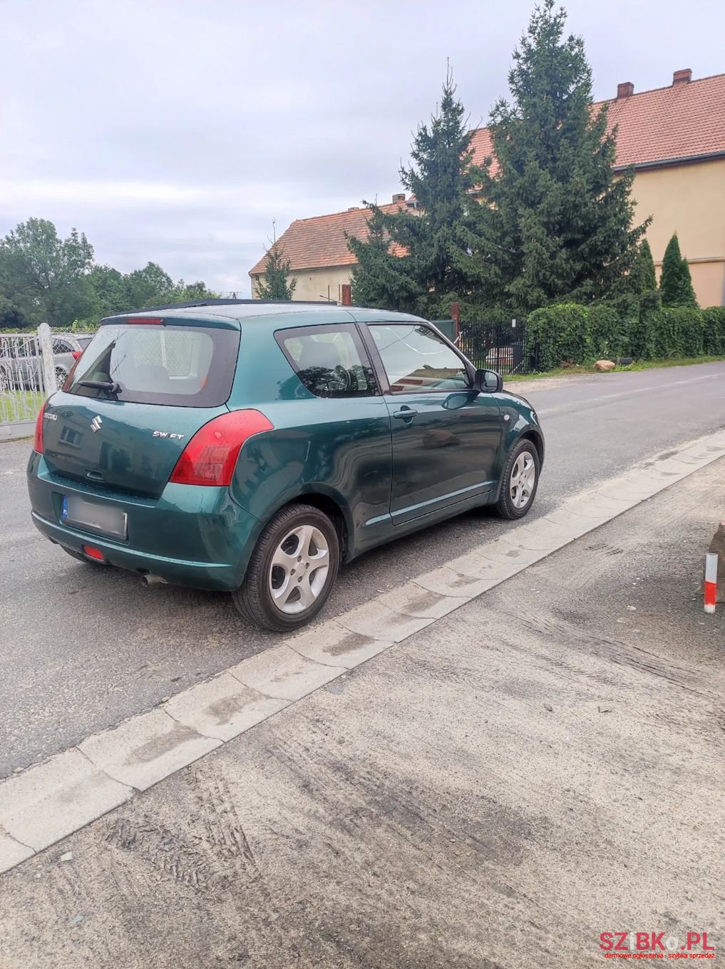 2006' Suzuki Swift photo #1