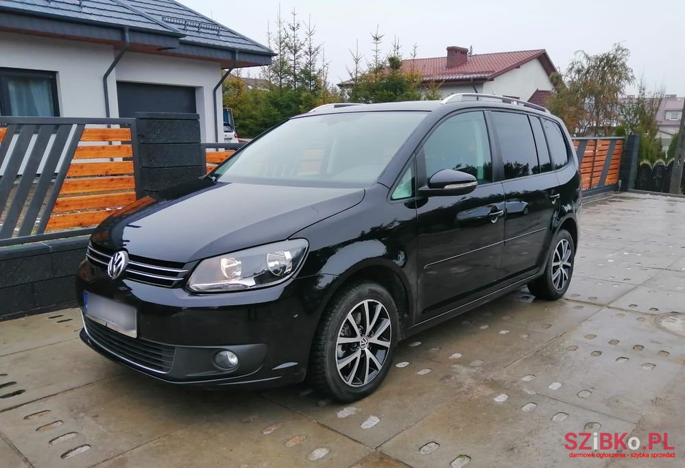 2014' Volkswagen Touran photo #1