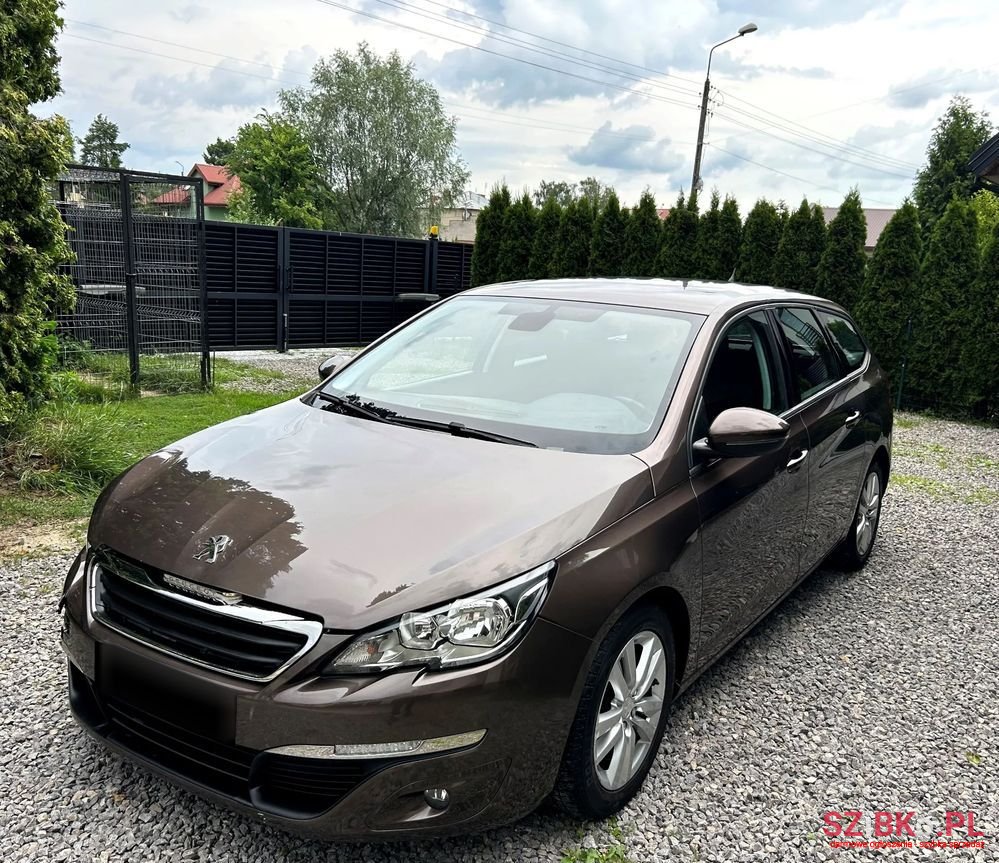 2014' Peugeot 308 Sw photo #1