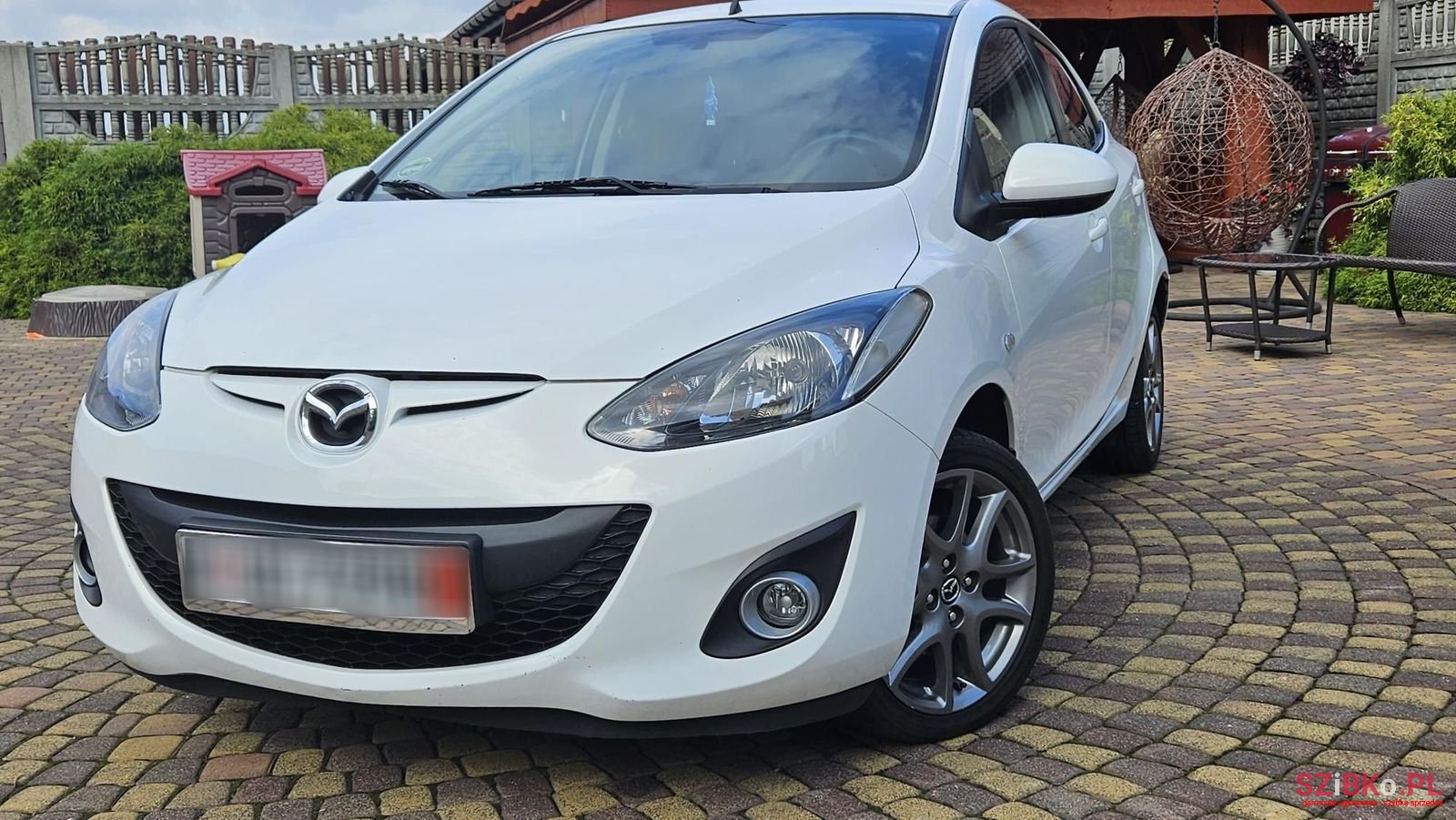 2013' Mazda 2 photo #1