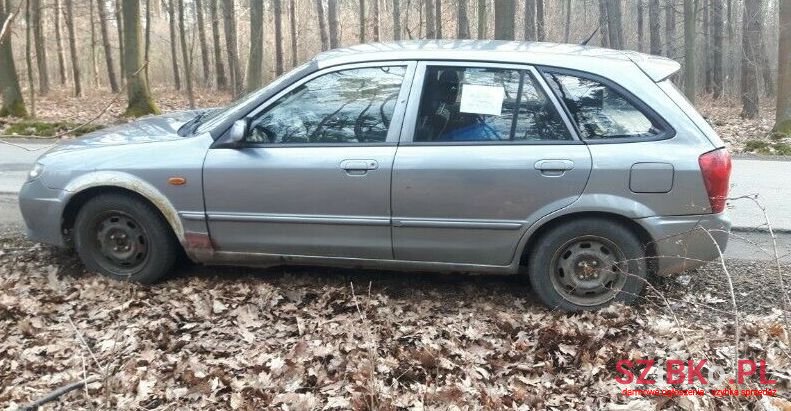 2002' Mazda 323 photo #1