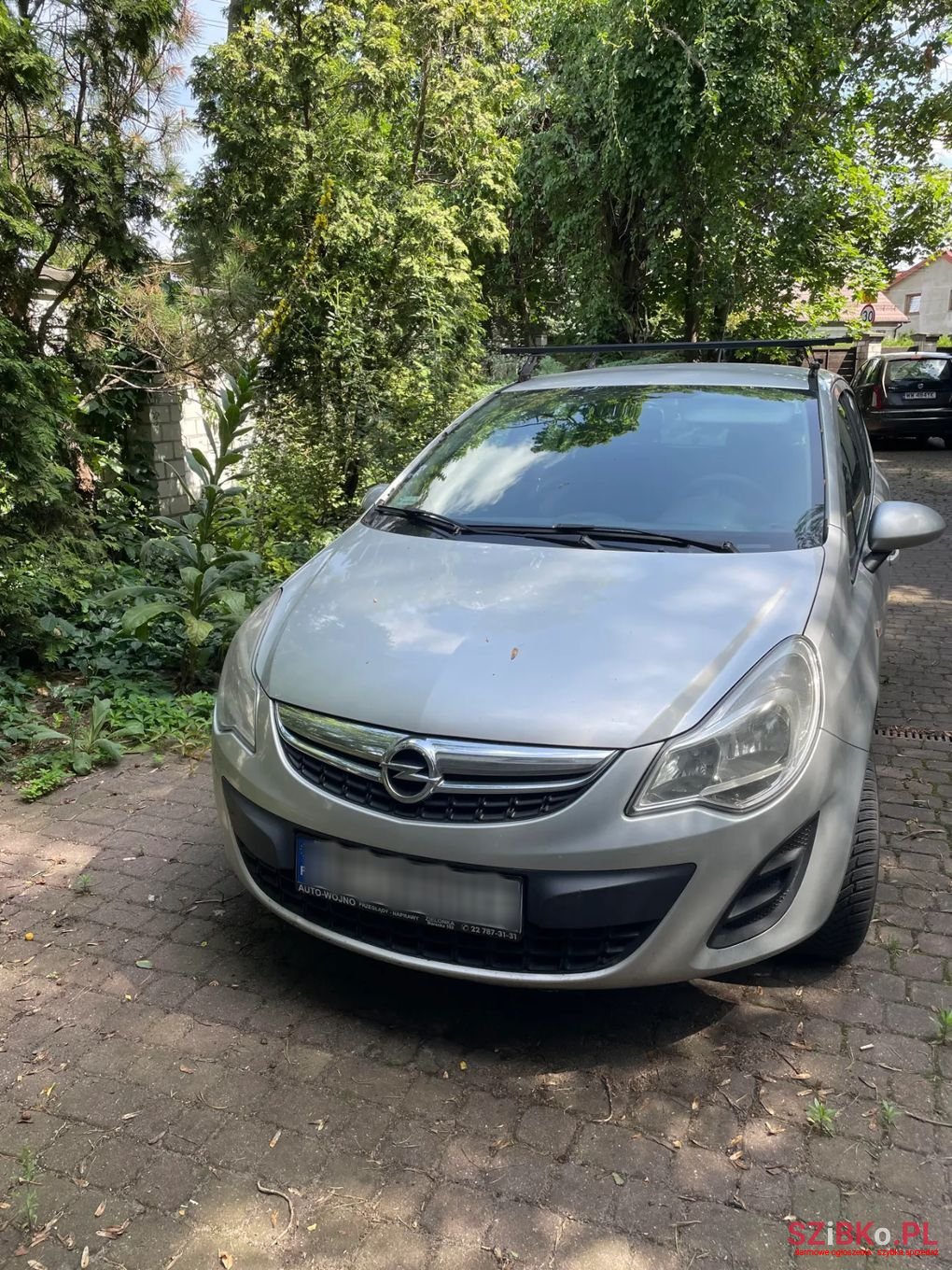 2011' Opel Corsa photo #1