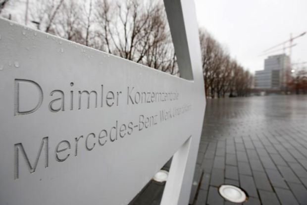 Daimler cuts dividend as Mercedes earnings take a hit from tariffs, diesel