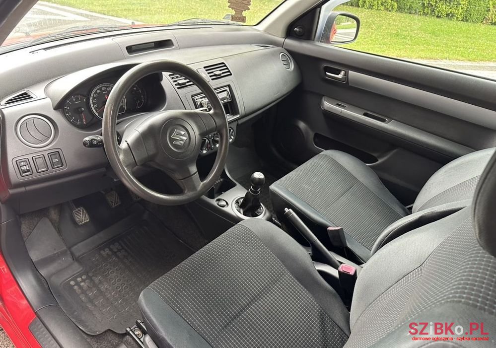 2007' Suzuki Swift 1.3 Sakura photo #5