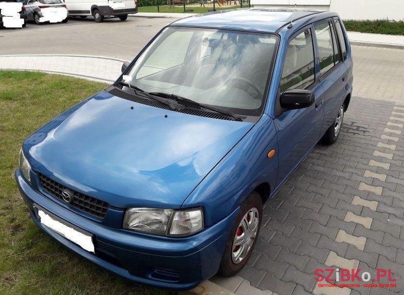 1999' Mazda Demio photo #1