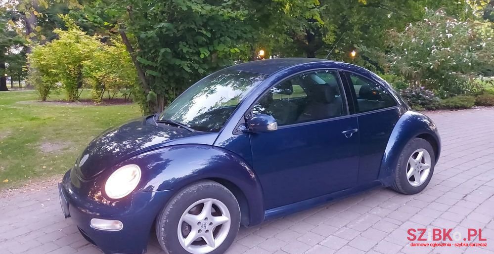 2003' Volkswagen New Beetle 1.4 photo #2