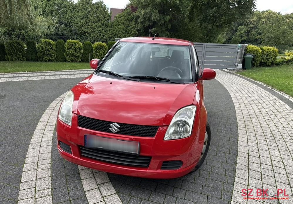 2007' Suzuki Swift 1.3 Sakura photo #1