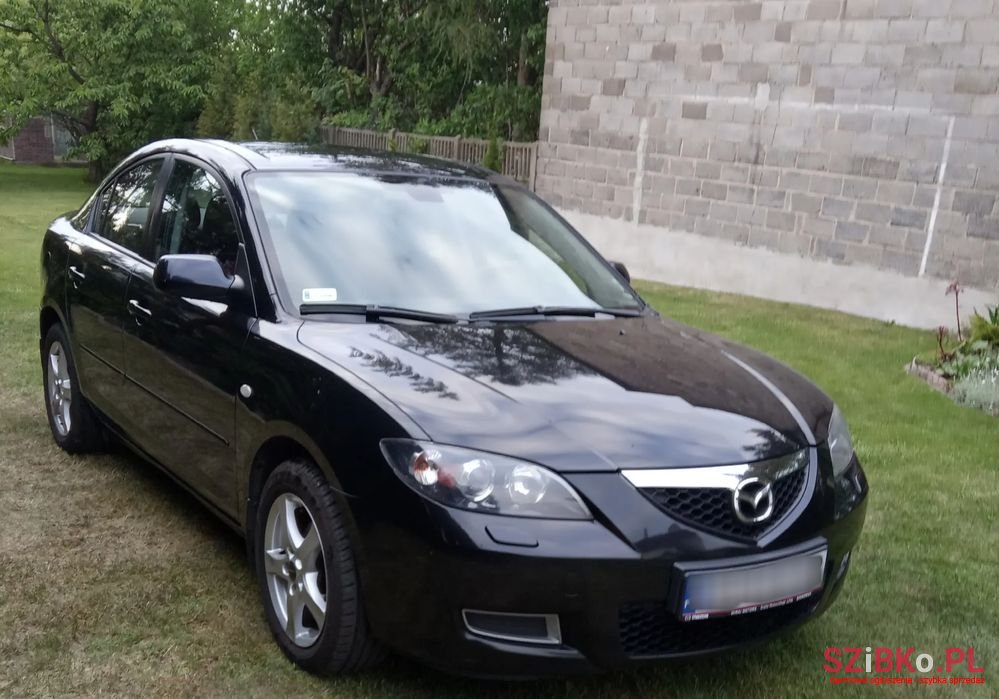2007' Mazda 3 photo #1