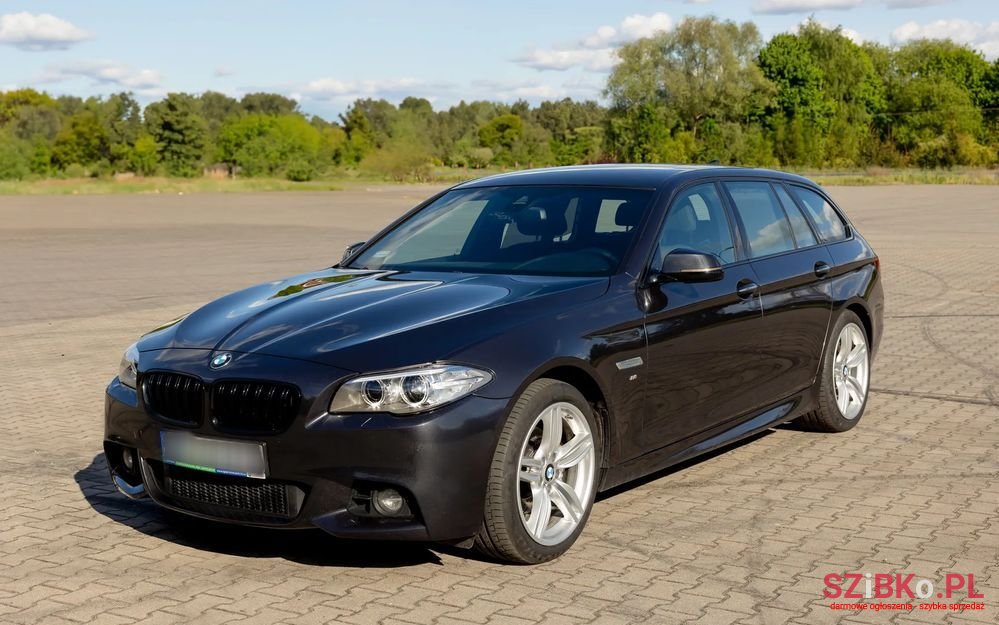 2014' BMW 5 Series 520D Touring Sport-Aut photo #1