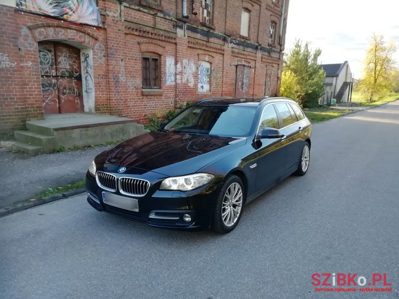 2015' BMW 5 Series 520D Touring photo #1