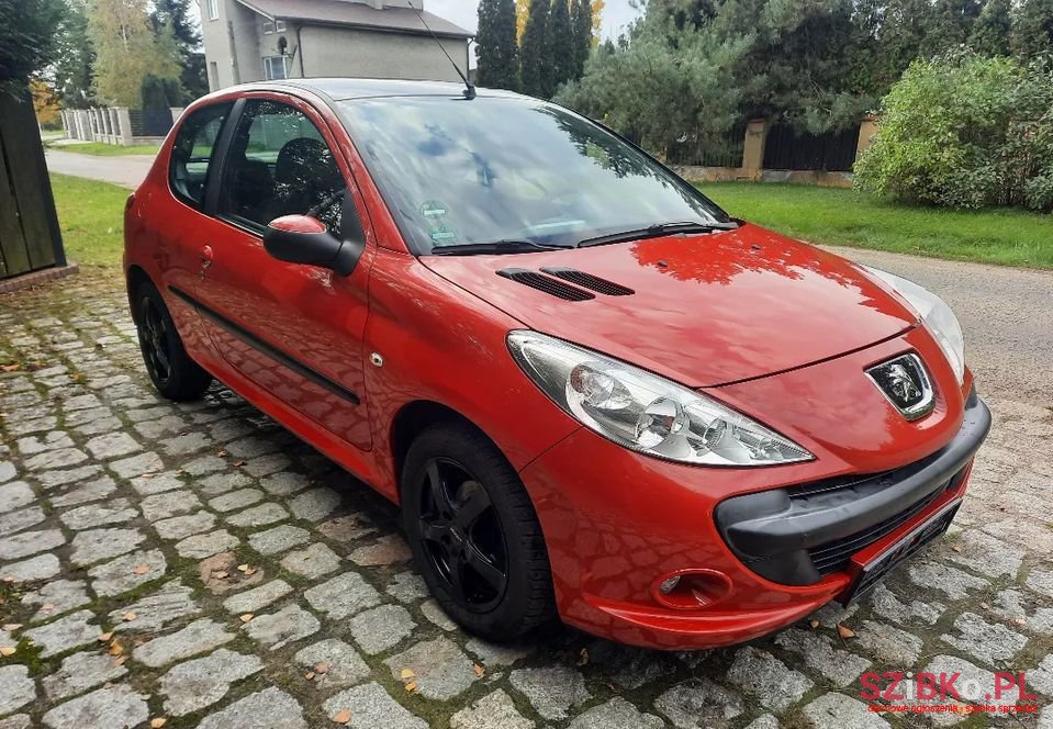 2011' Peugeot 206 Plus photo #1