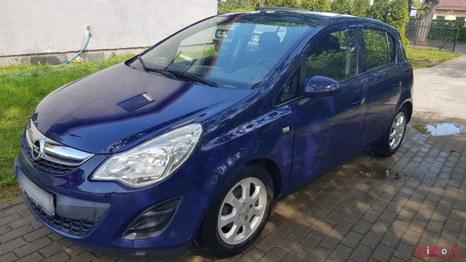 2012' Opel Corsa photo #2